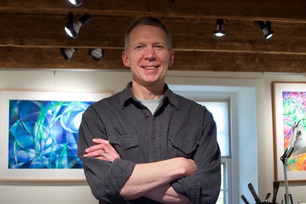 portrait of watercolor artist Geoffrey Thulin in his studio